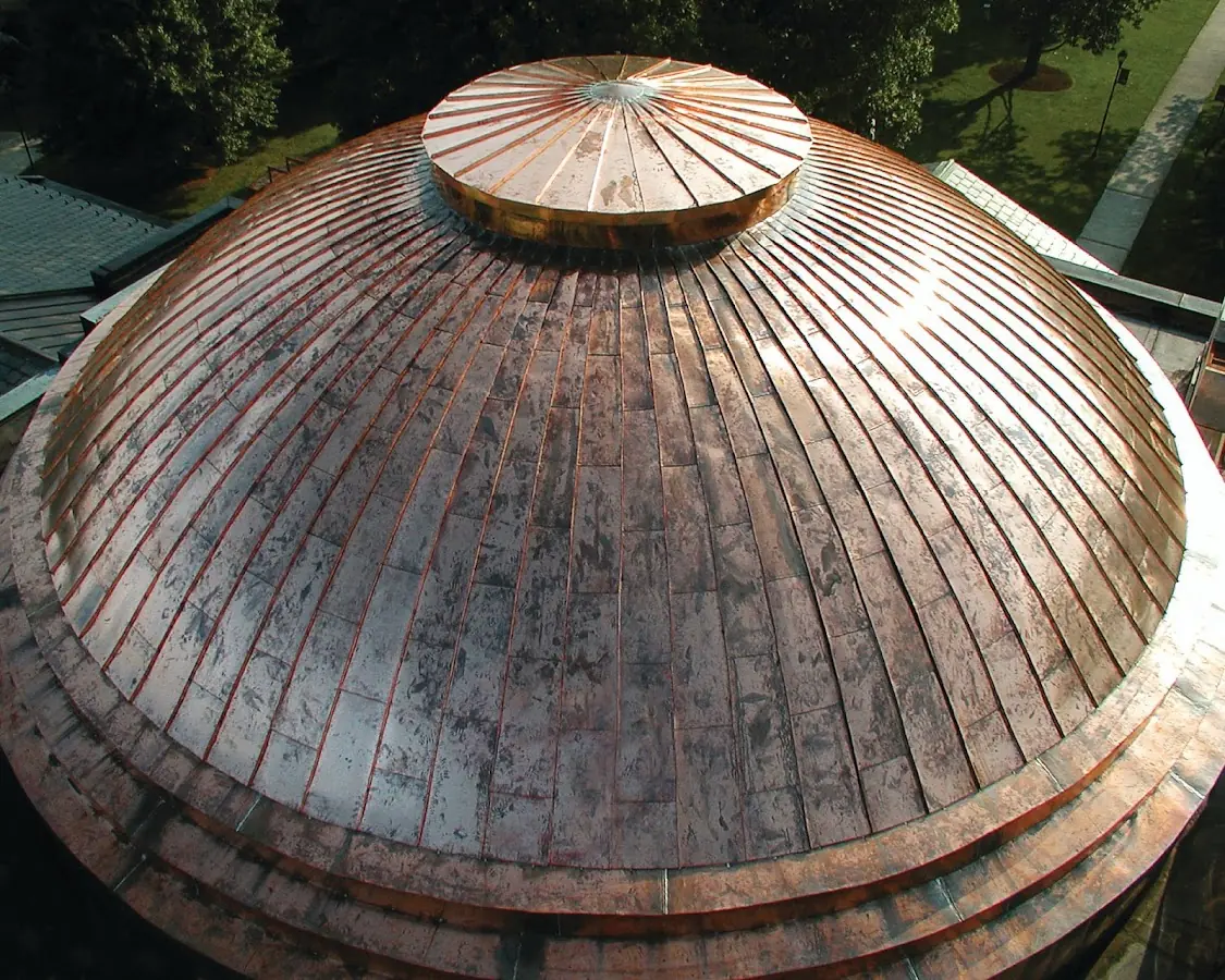 Craftsman Roofing crew installing a new roof in Calumet